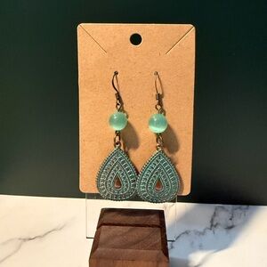 Elegant Teardrop Earrings with Green Accents